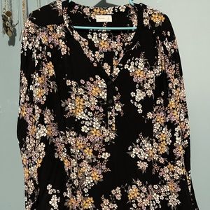 Long sleeved, flowery blouse